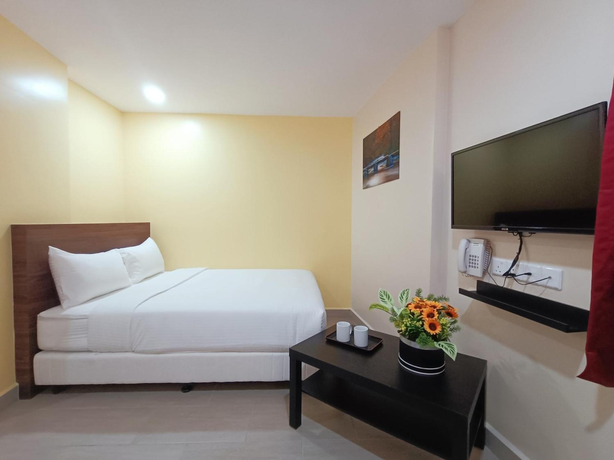 Capital O 90897 Island City Hotel 乔治敦 外观 照片