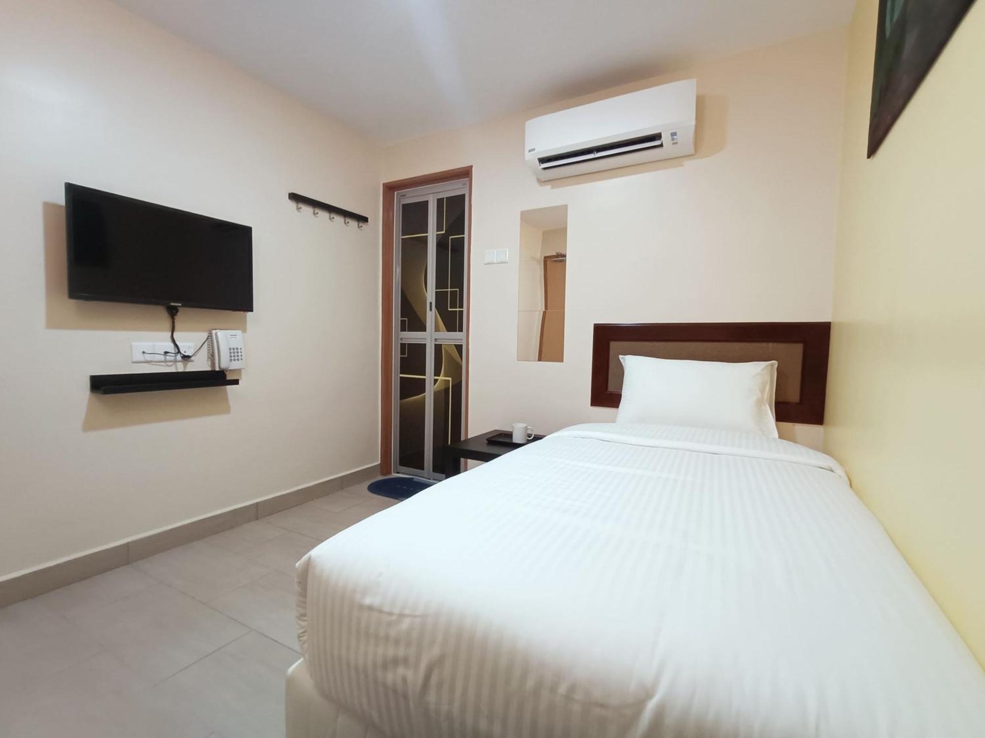 Capital O 90897 Island City Hotel 乔治敦 外观 照片
