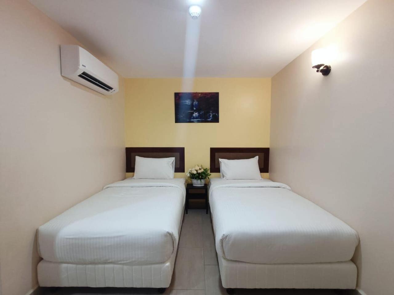 Capital O 90897 Island City Hotel 乔治敦 外观 照片