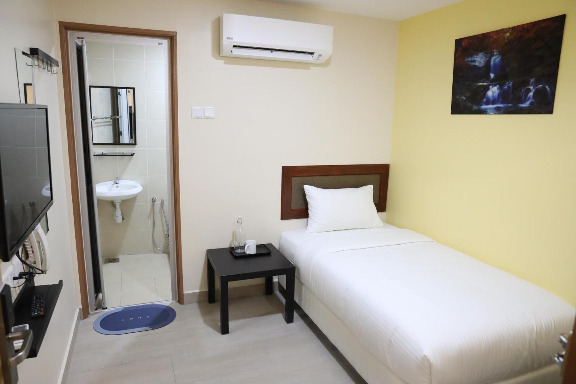 Capital O 90897 Island City Hotel 乔治敦 外观 照片