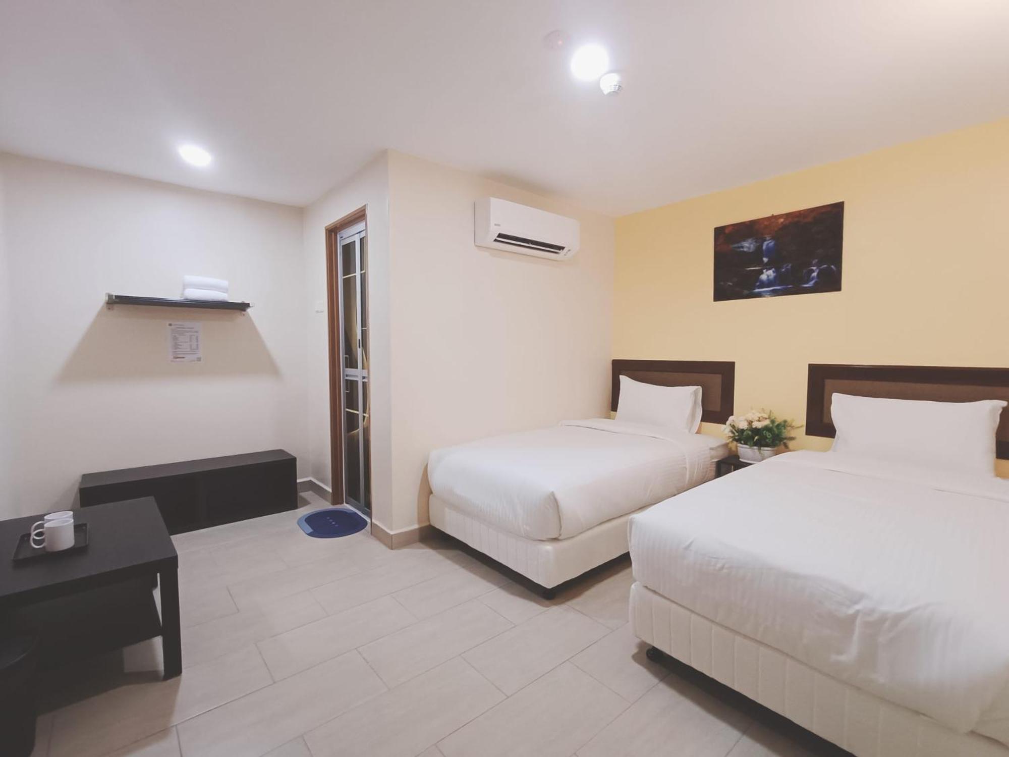 Capital O 90897 Island City Hotel 乔治敦 外观 照片