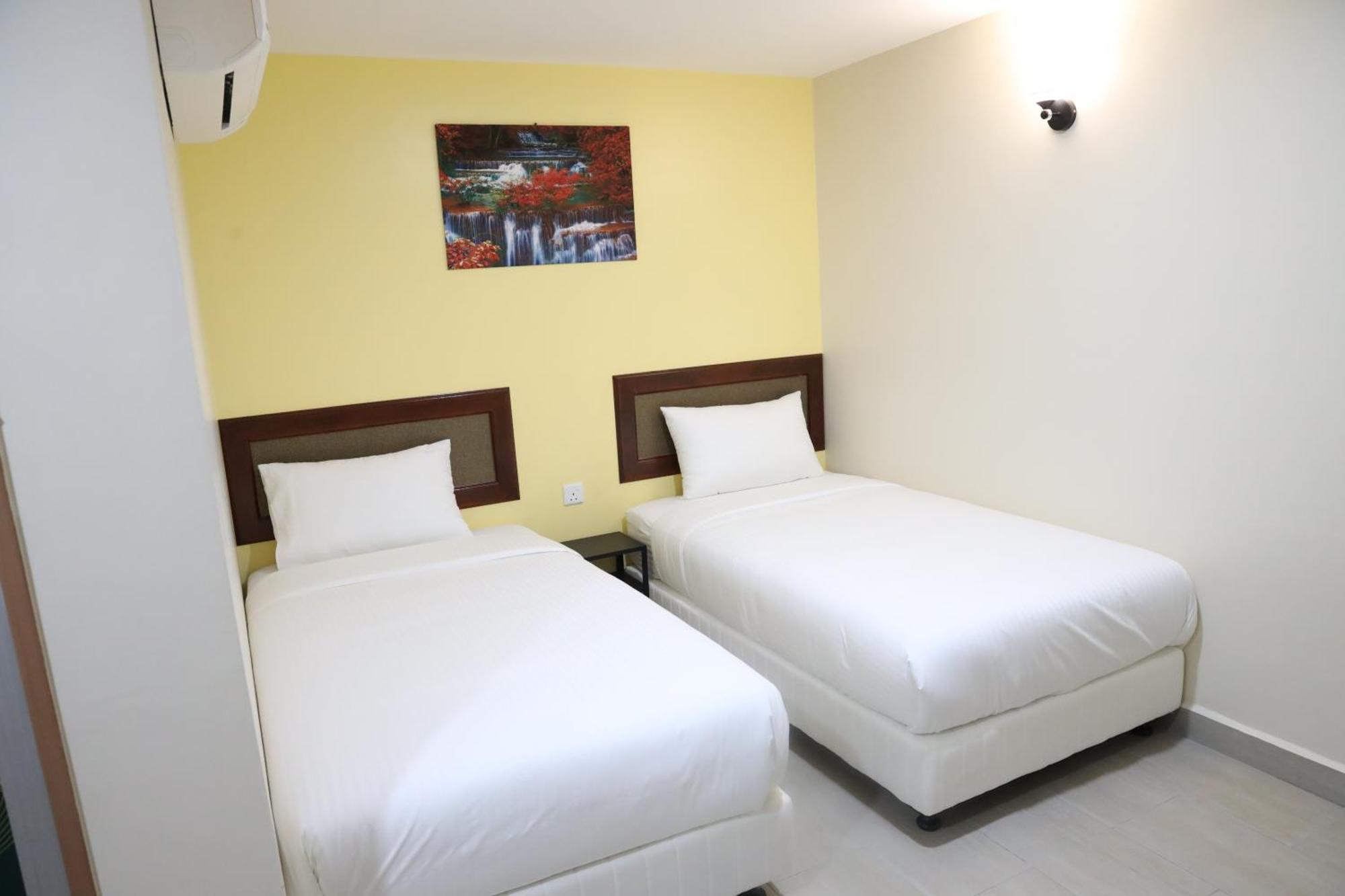 Capital O 90897 Island City Hotel 乔治敦 外观 照片