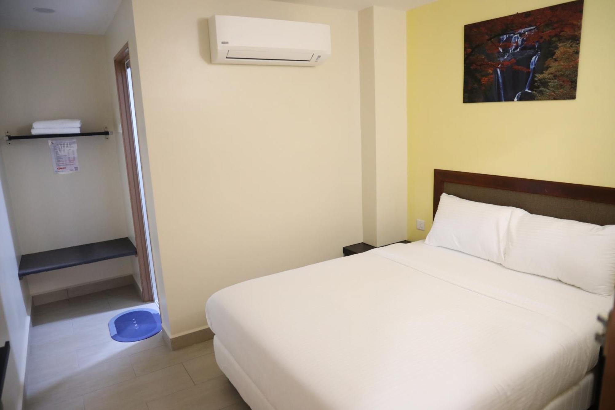 Capital O 90897 Island City Hotel 乔治敦 外观 照片